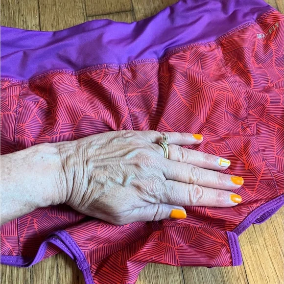 Nike dri-fit shorts. Purple and coral like new small. - Picture 6 of 6